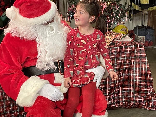 image of Santa Claus and a little girl.