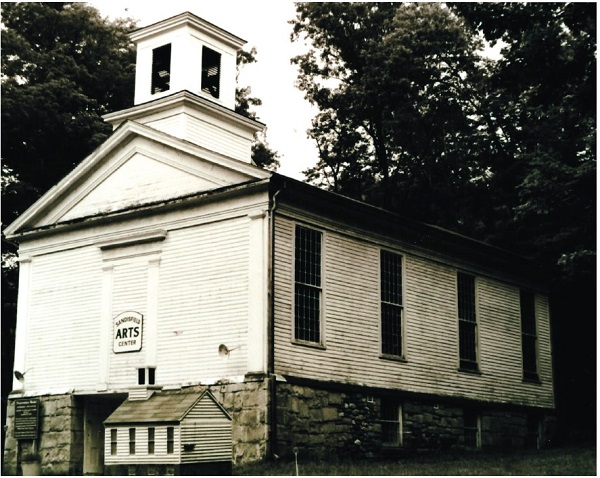 image of Montville Church with the Mini out front.