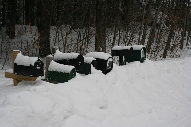 image of mailboxes buried in the snow.