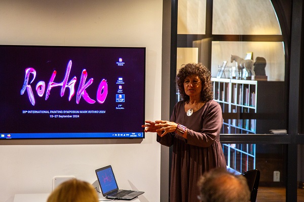 image of Jaye Alison presenting the Journey to Beyond International Show.  