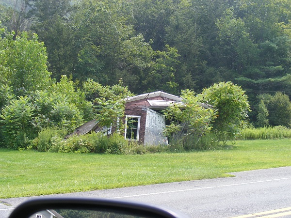 image of a shack falling down.